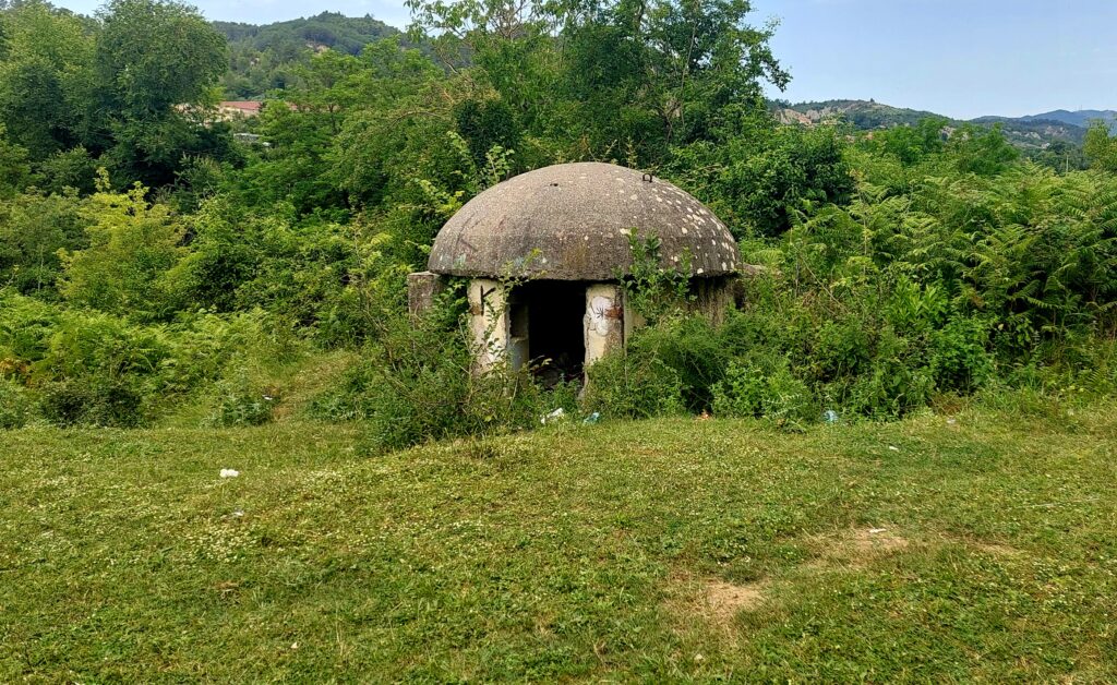 A concrete communist-era military bunker in Peze, Albania, a symbol of Enver Hoxha's paranoid regime