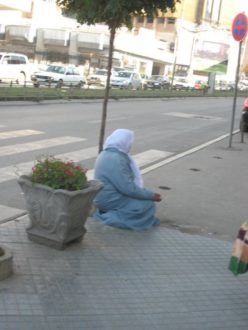 Woman begging on the street