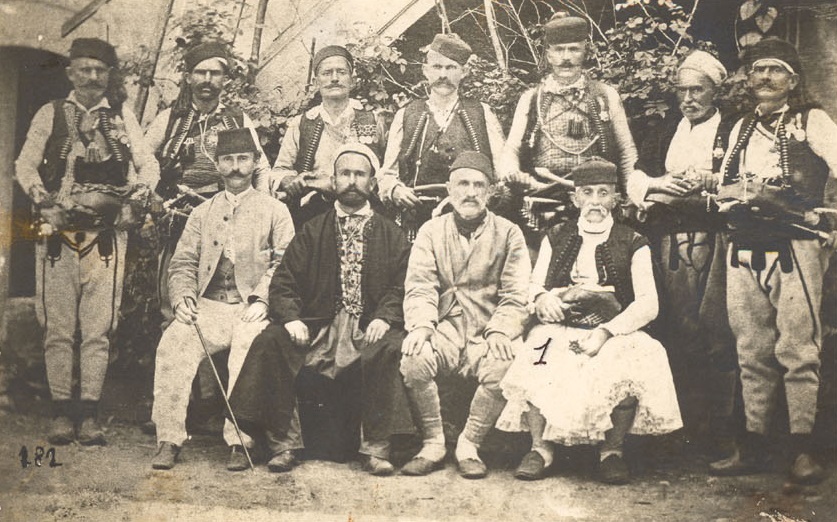 Black-and-white 1878 photograph by Pjetër Marubi of the Sanjak of Shkodra delegation at the League of Prizren, the men wearing traditional Albanian plis caps