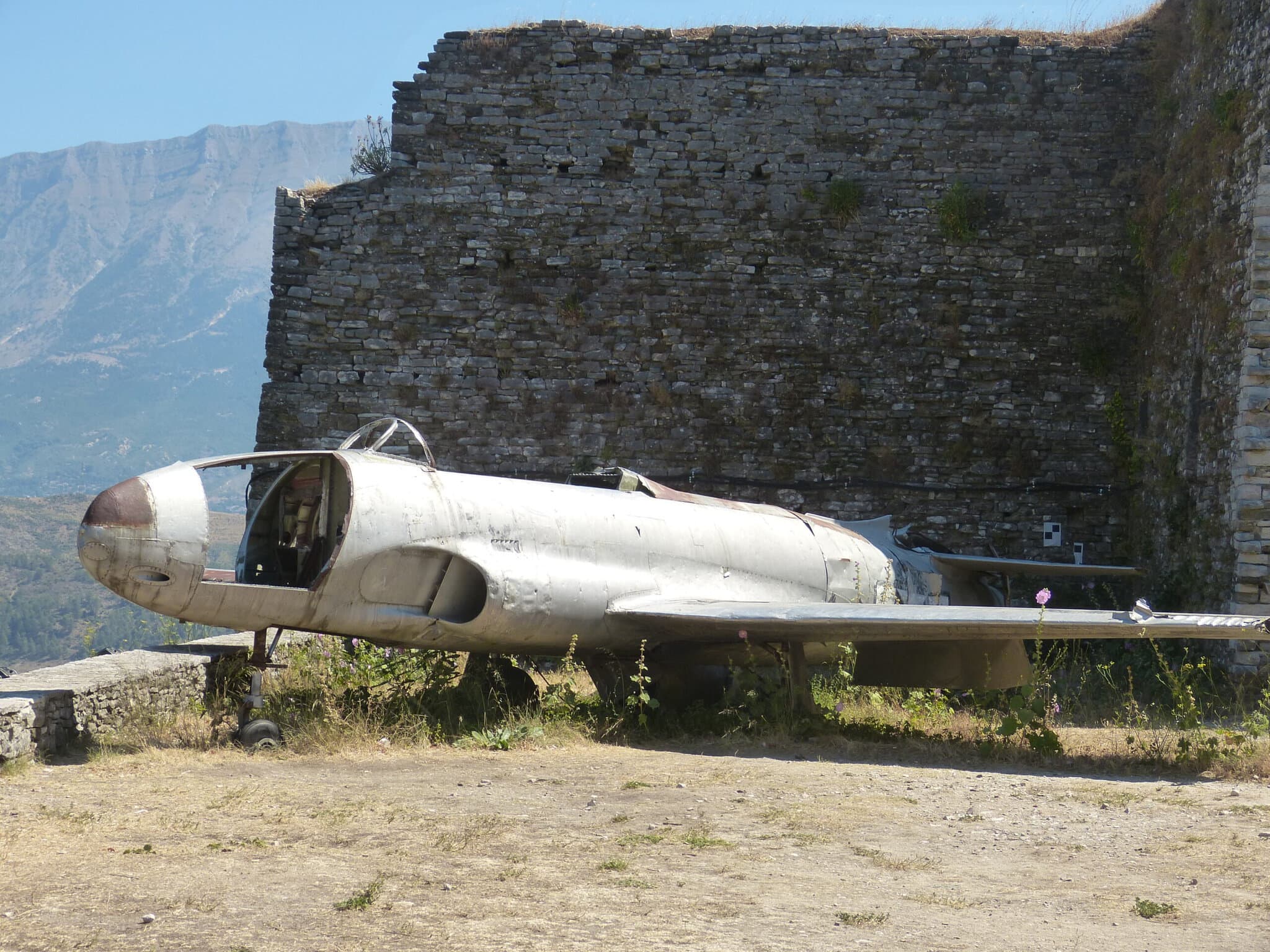 The wreckage of an American Lockheed T-33 jet trainer on display on the terraces of Gjirokastra Castle
