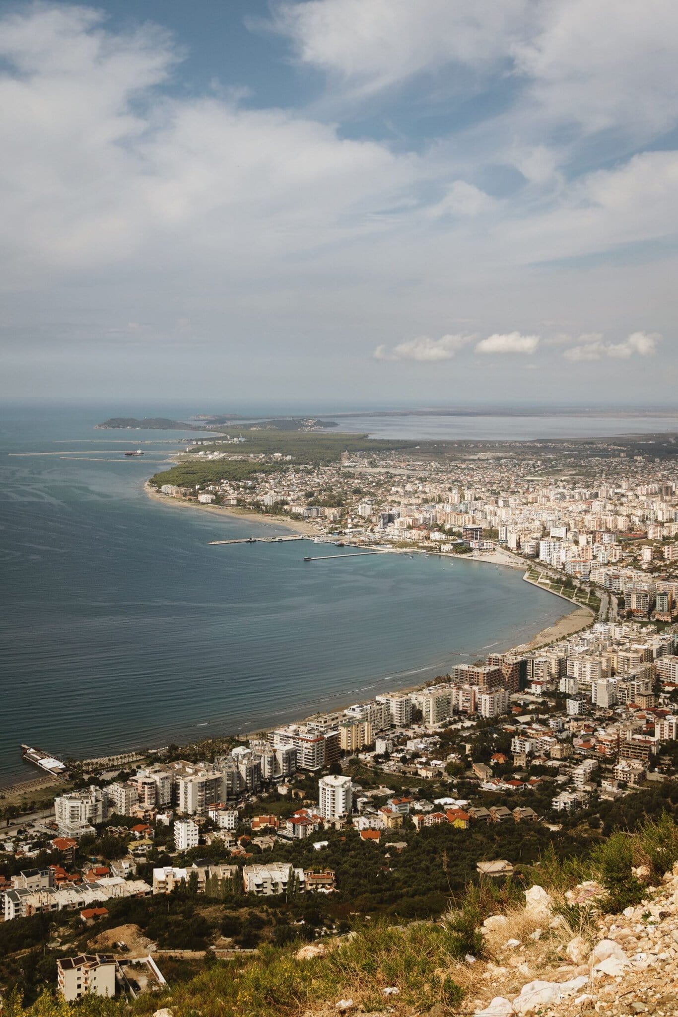 Aerial view of Vlorë, Albania's coastline and bay where the city meets the sea