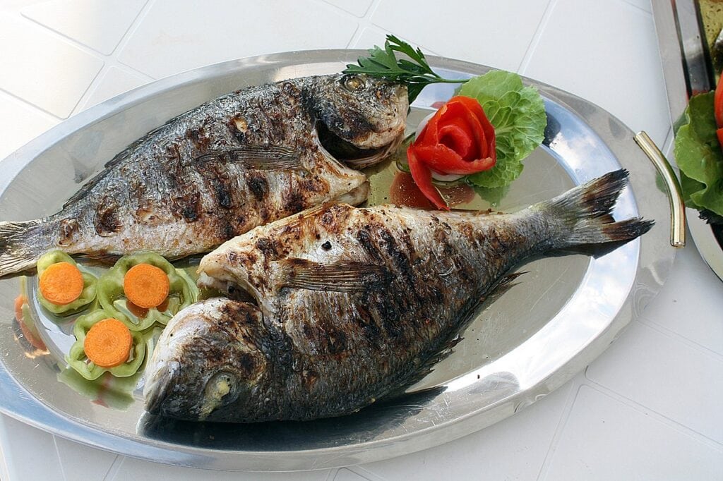 Simply plated whole grilled fish, the style most Tirana restaurants serve their daily catch
