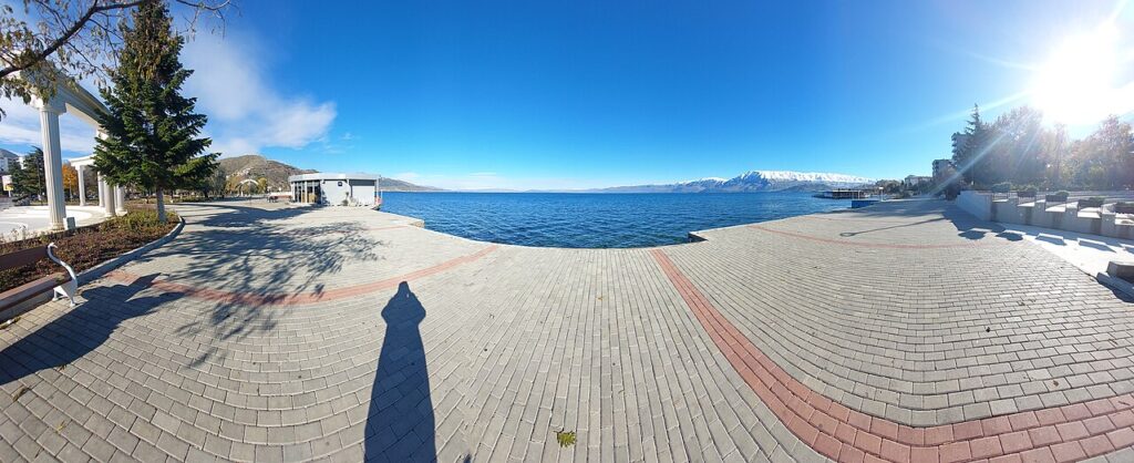 Panoramic view of the Pogradec lakeside promenade along Lake Ohrid, Albania