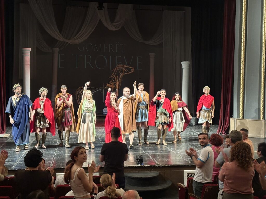Actors in costume during the curtain call at the Migjeni Theatre in Shkodra