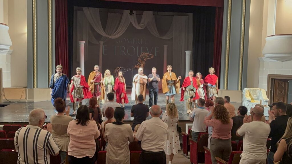 Performers in costume on stage at the Migjeni Theatre in Shkodra